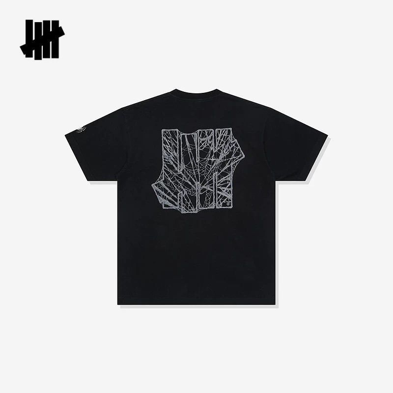 เสื้อยืดแขนสั้นลายโลโก้ใยแมงมุ - Streetwear Brand Undefeated บทวิจารณ์และราคา
