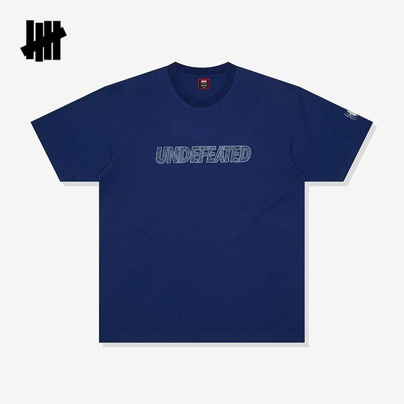 เสื้อยืดแขนสั้นลายโลโก้ใยแมงมุ - Streetwear Brand Undefeated บทวิจารณ์และราคา